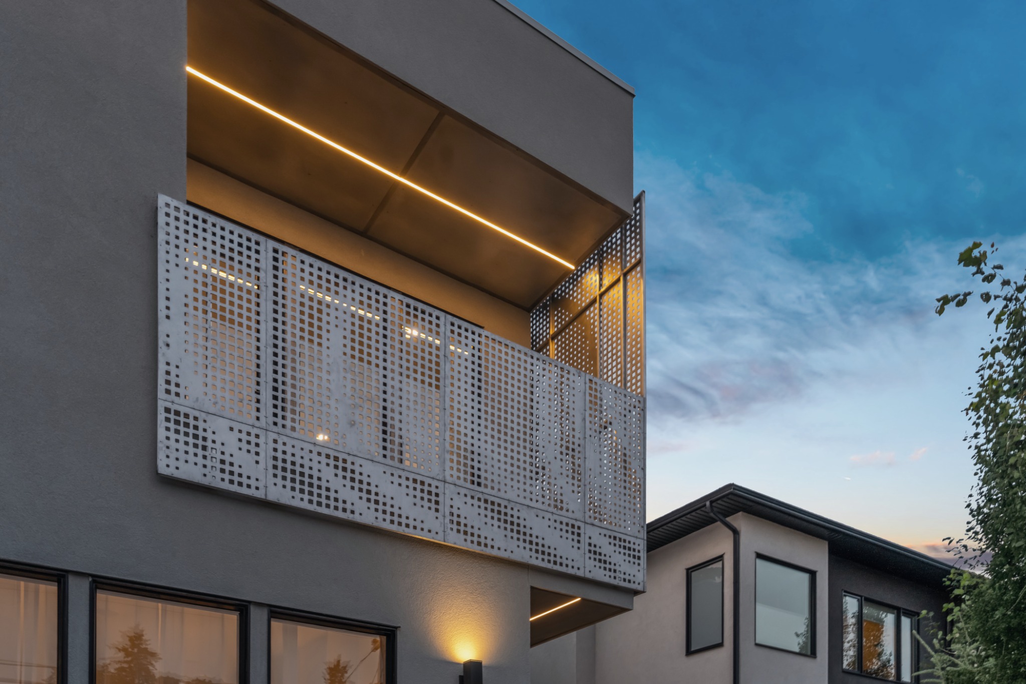Perforated metal facade and balcony detail